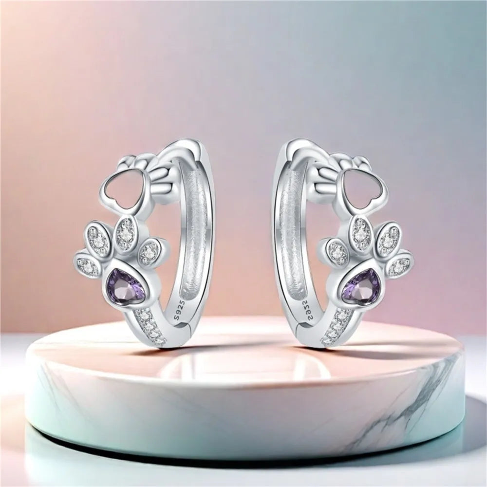Paw Huggie earrings in silver with zircons and heart-shaped gemstone