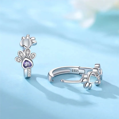 Paw Huggie earrings in silver with zircons and heart-shaped gemstone
